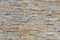 Natural facade stone decoration quartzite background texture. modern granite stone wall