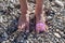Natural Feet Holding A Beach Flower