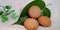 Natural flavor biscuits  with green leaf at white background