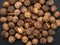 Natural fresh walnut on a black background. Top view. The concept of a healthy diet, natural antioxidants. Natural light. Food