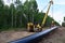 Natural gas pipeline project. Pipes for oil and gas pipelines construction. Fuel and energy concept. Oil pipeline that would carry