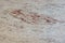 Natural granite slab, beige with red dots, called Ivory Brown