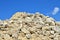 Natural gray gypsum stone. Close up image of stones with black and white. Industrial mining area. Limestone mining, quarry