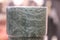 natural greenish veined marble stone. Ceramic vase with marble pattern in the interior, Italian matte granite ceramic