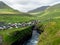 Natural harbour gorge nearby idyllic village Gjogv.