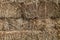 natural hay fodder feed straw bale stacked binded bound close-up suitable for background website backdrop