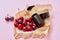 Natural healthy organic cosmetics, fruits, cherries, bottle with cosmetic product