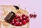 Natural healthy organic cosmetics, fruits, cherries, bottle with cosmetic product