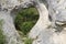 Natural heart dug(accentuated) in the rock