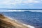 Natural ice blocks breaking up against shore during spring weather. Arctic, winter, spring landscape. Ice drift