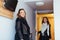 Natural image of two young women entering in hotel room