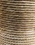 Natural jute rope twisted wound pillar background, textile texture endless