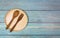 Natural kitchen tools wood products / Kitchen utensils with wooden plate spoon and fork in the dinner table background