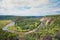 Natural landscape, the bend of a mountain river on a sunny day, view from the top