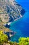 Natural landscape with curved coastline and blue sea