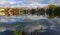 Natural Landscape, Reflection of clouds and lodges in the water of a quiet lake in New Jersey