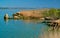 Natural landscape, shell stones in the water near the shore of the Khadzhibey estuary