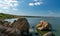 Natural landscape, shell stones in the water near the shore of the Khadzhibey estuary