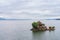 Natural landscape of small island temples and ancient stone arch bridges on Erhai Lake in Yunnan Province, China