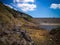 Natural Landscape Titab Ularan Dam With Hillside Dry Soil And Ground Rocks View In The Dry Season