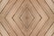 Natural light brown teak wood panel with abstract diamond pattern