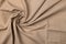 Natural linen fabric texture. Flaxen circular spiral textile background