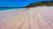 Natural lines appear on sand of beautiful Cerro Brujo beach