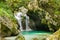 Natural long-exposure twin waterfall on Soca river in Slovenia. Velika Korita Soce