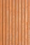 Natural old wood fence planks wooden close board texture, overlapping light reddish brown closeboard terracotta background pattern