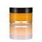 Natural orange sugar lip scrub on white.