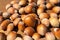 Natural organic hazelnuts on the wood table background
