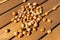 Natural organic hazelnuts on the wood table background