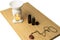 Natural organic oils in aromatherapy. Aroma lamp, pendant aromatic and bottles with natural essential oils on bamboo stand