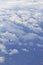 Natural panorama of blue sky with light clouds from plane. Concept of air transport, travel, tourism, business. Environmental