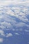 Natural panorama of blue sky with light clouds from plane. Concept of business. Environmental problem of gas pollution