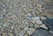 Natural paving of gneiss and granite irregular stones folded into a beautiful pattern where larger stones are surrounded by small