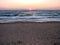 Natural picture of the rainbow colors of sunrise on the coast of the Azov Sea.