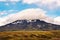 Natural pileus cloud covered on volcanic mountainin Icelandic Highlands on daylight at Thorsmork, Iceland