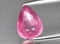 natural pink spinel gem on the background