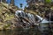 Natural pool in bottom of Radule waterfall in Corsica Island