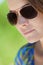 Natural Portrait of Beautiful Woman In Sunglasses