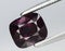 natural purple spinel gem on the background