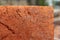 Natural red brick. background and texture. uneven rough motif,