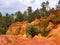 Natural red ocher cliffs in village of Roussillon Provence in France