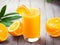 Natural Refreshment: Exquisite Orange Juice with Wood on the Rock Photography for Citrus Lovers