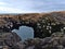 Natural rock arch formed of volcanic basalt on the rough Atlantic coast of SnÃ¦fellsnes, Iceland near Arnarstapi.