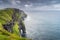 Natural rock arch, part of iconic Cliffs of Moher, Ireland