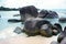 Natural rock formation in the sea and on a white sand beach in Belitung Island.