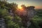 natural rock formation surrounded by lush greenery, with view of the sun rising over the horizon