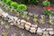 Natural rock retaining wall in a garden